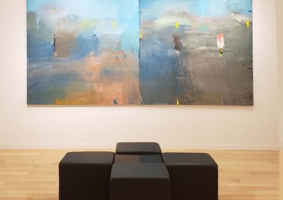 Installation view of Jim Dine diptych painting with tools and implements on a field of blue