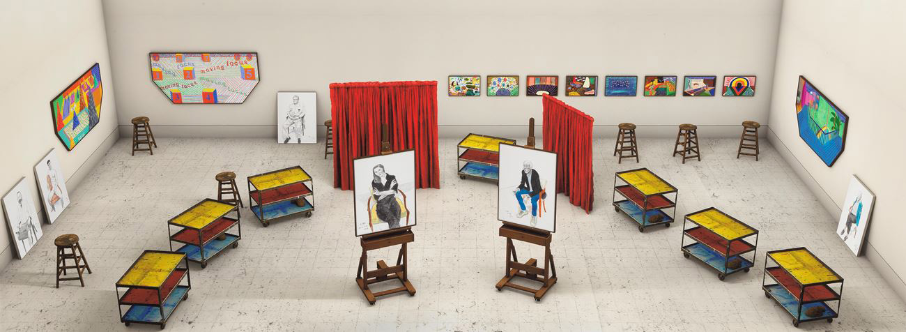 David Hockney print showing art room with trollies